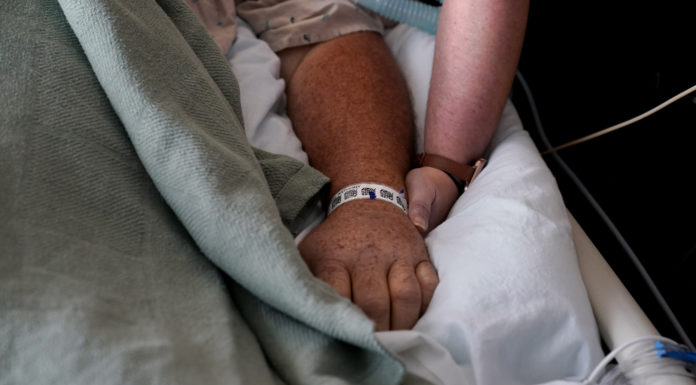 Individuals give well being care system failing mark: AP-NORC ballot