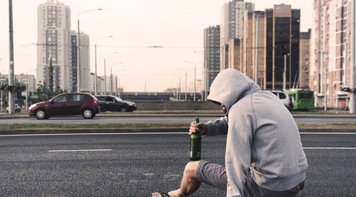 Teen alcohol misuse is a driver of poorer well being and dissatisfaction in midlife