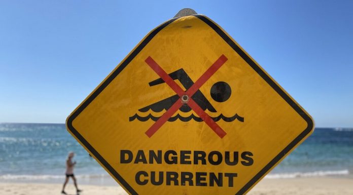 Stopping drowning by bettering seashore security signage