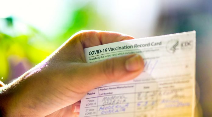 Will we nonetheless want to carry onto COVID-19 vaccination playing cards?
